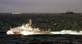 MSDF, Maritime agency boats pursue ''unidentified'' vessel